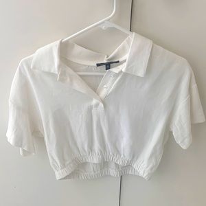 Kendall & Kylie Short Sleeve Elastic Polo Shirt.